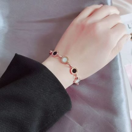 18K Gold Plated Stainless Steel Roman Numeral Bracelet with Black and White Mother of Pearl