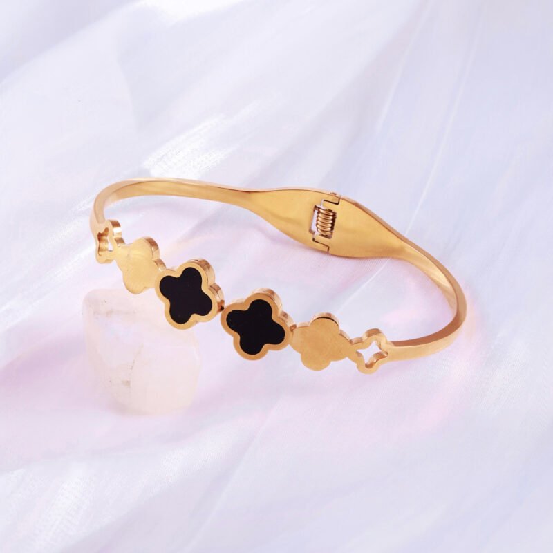 Chic Black Clover Bangle in Gold