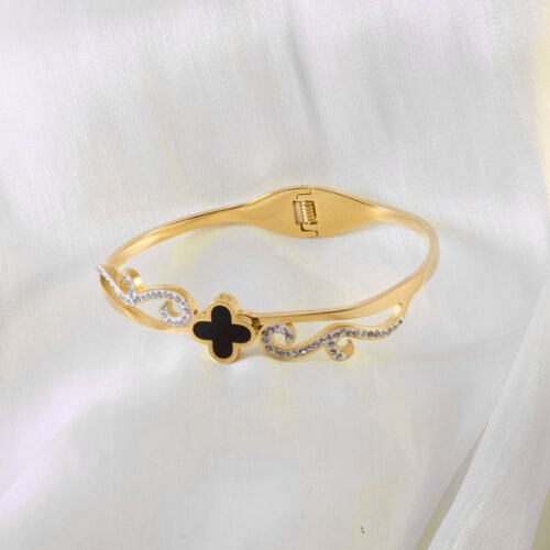 Stylish Scroll Bangle in Gold with Black and Crystal Accents