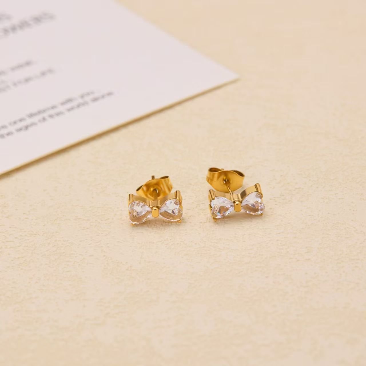 Dainty Bow CZ Stud Earrings - Image 4