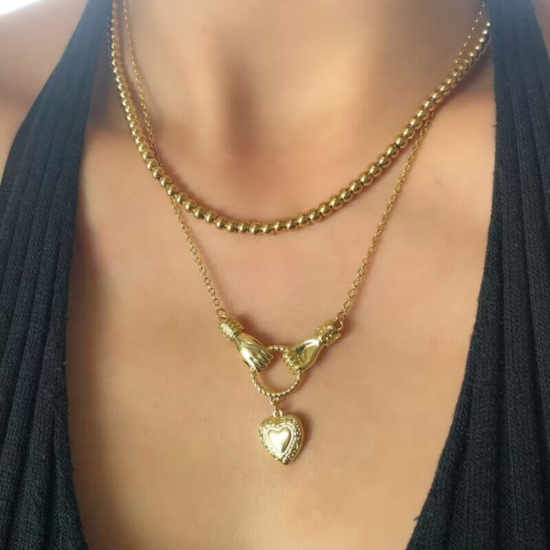 Holding Hands Heart Necklace