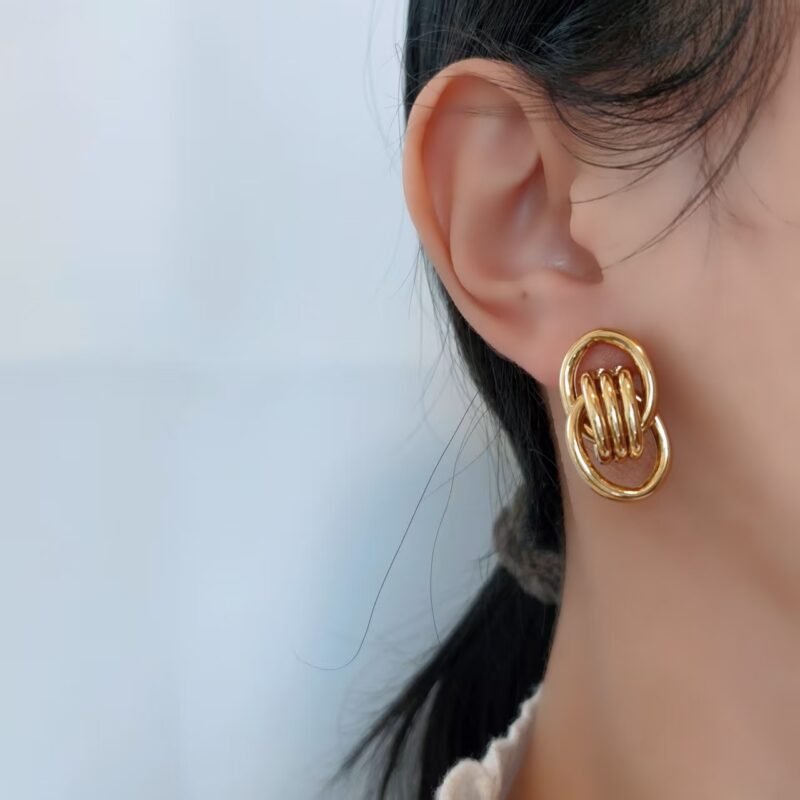 Infinity Twist Link Gold Drop Earrings