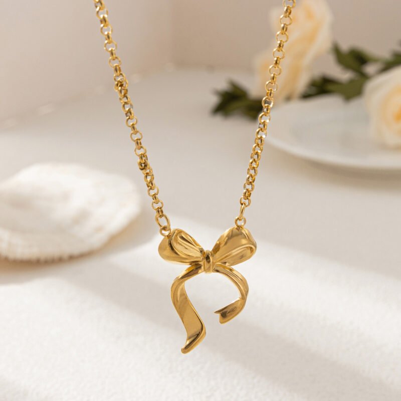 Golden Bow Whisper Necklace